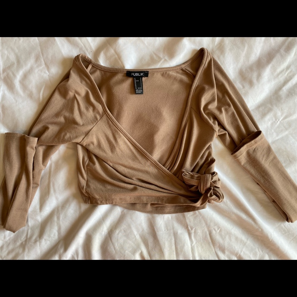 Trendy tan cross over top that ties on the side